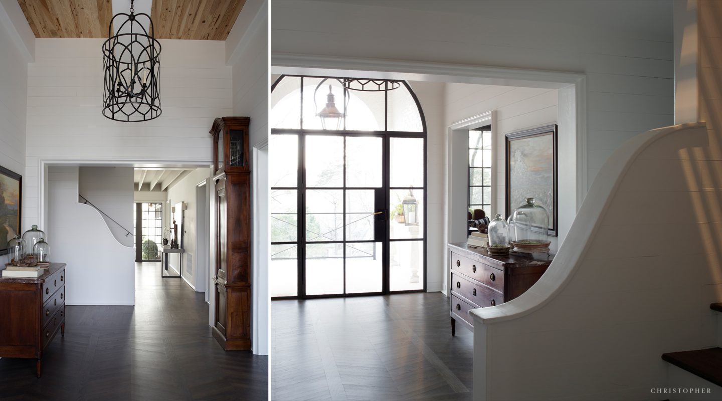 Transitional Estate Foyer and Custom Black Steel Arched Doorway