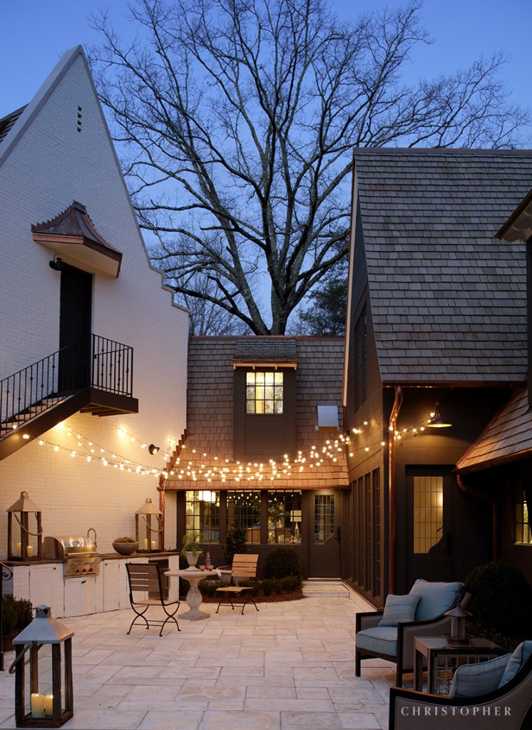 Transitional Estate Outdoor Living Patio with String Lights and Built-in Grill